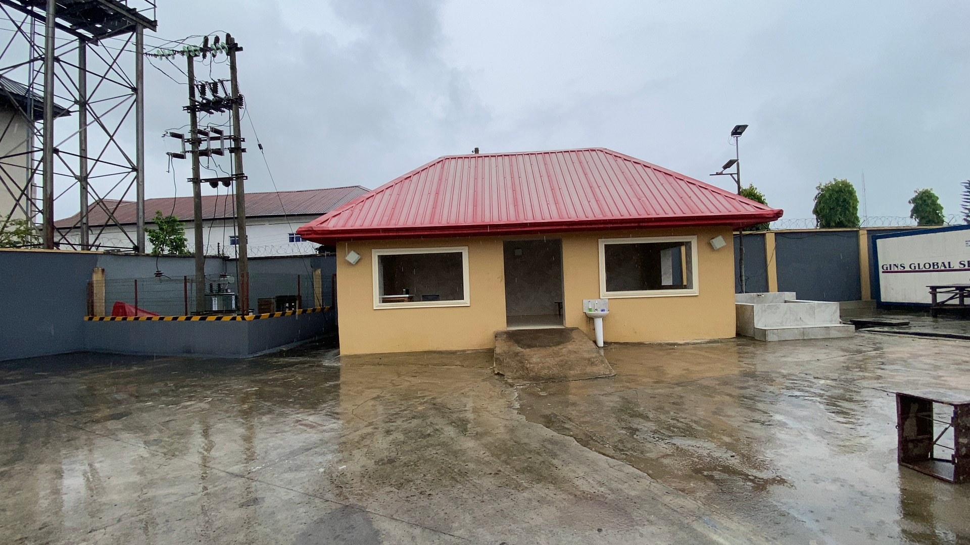 Guardhouse and hand-washing station at the yard entrance